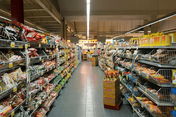 Interior of a discount grocery store with assorted food items on shelves