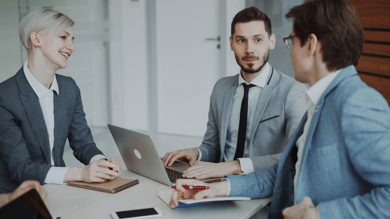 The Biggest Mistakes Entrepreneurs Make with Business Financing 2 Entrepreneurs working together on laptops
